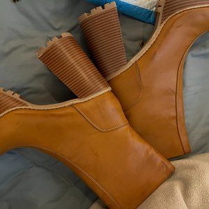high-heeled platform ankle boots in tan